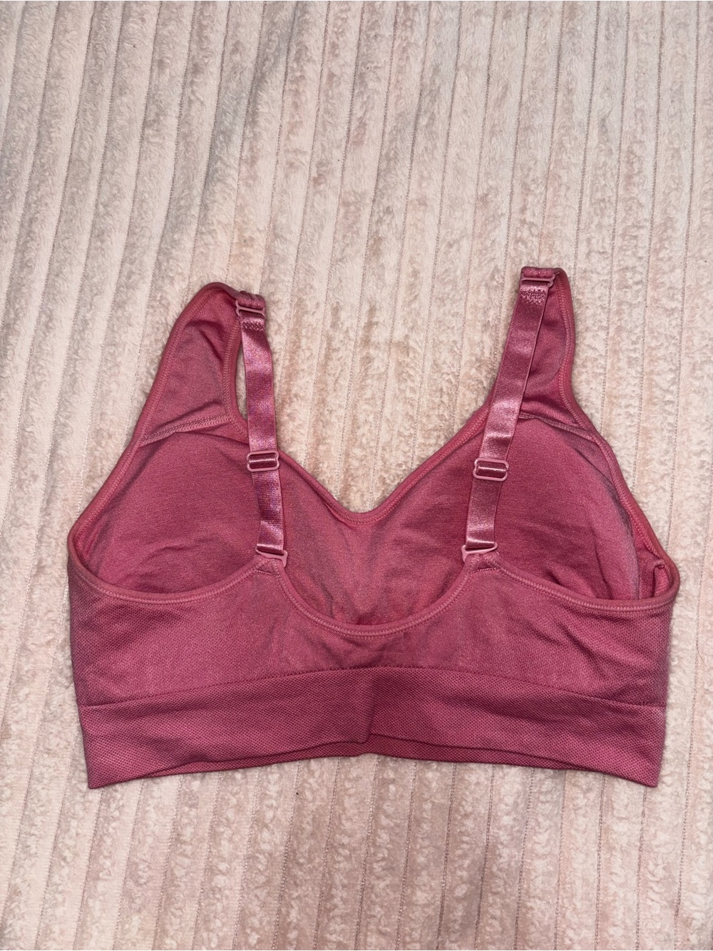 Puma Seamless Sports Bra in Dusty Rose with Gold Logo - Picture 2 of 3
